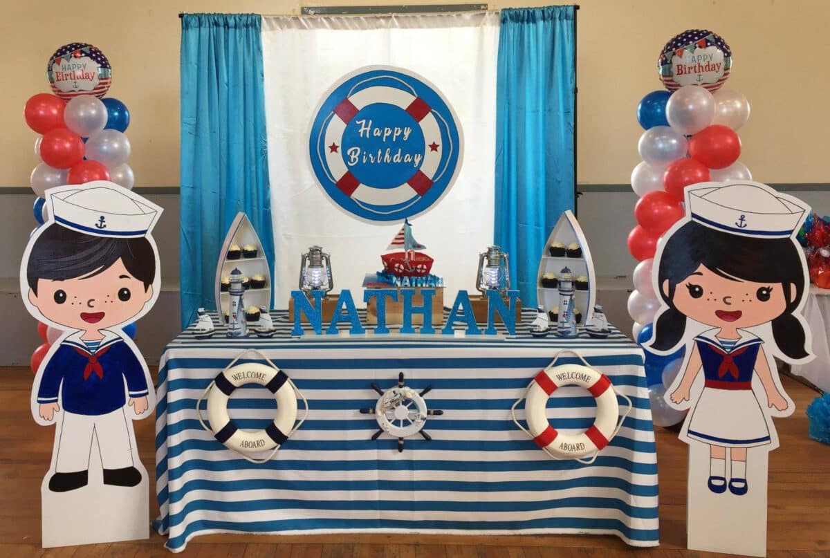 Nautical Party With Sailor Cutouts and Birthday Cake