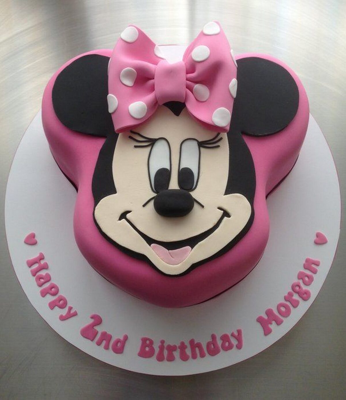 Pink Minnie Mouse Shaped Birthday Cake with Pink Bow Tie