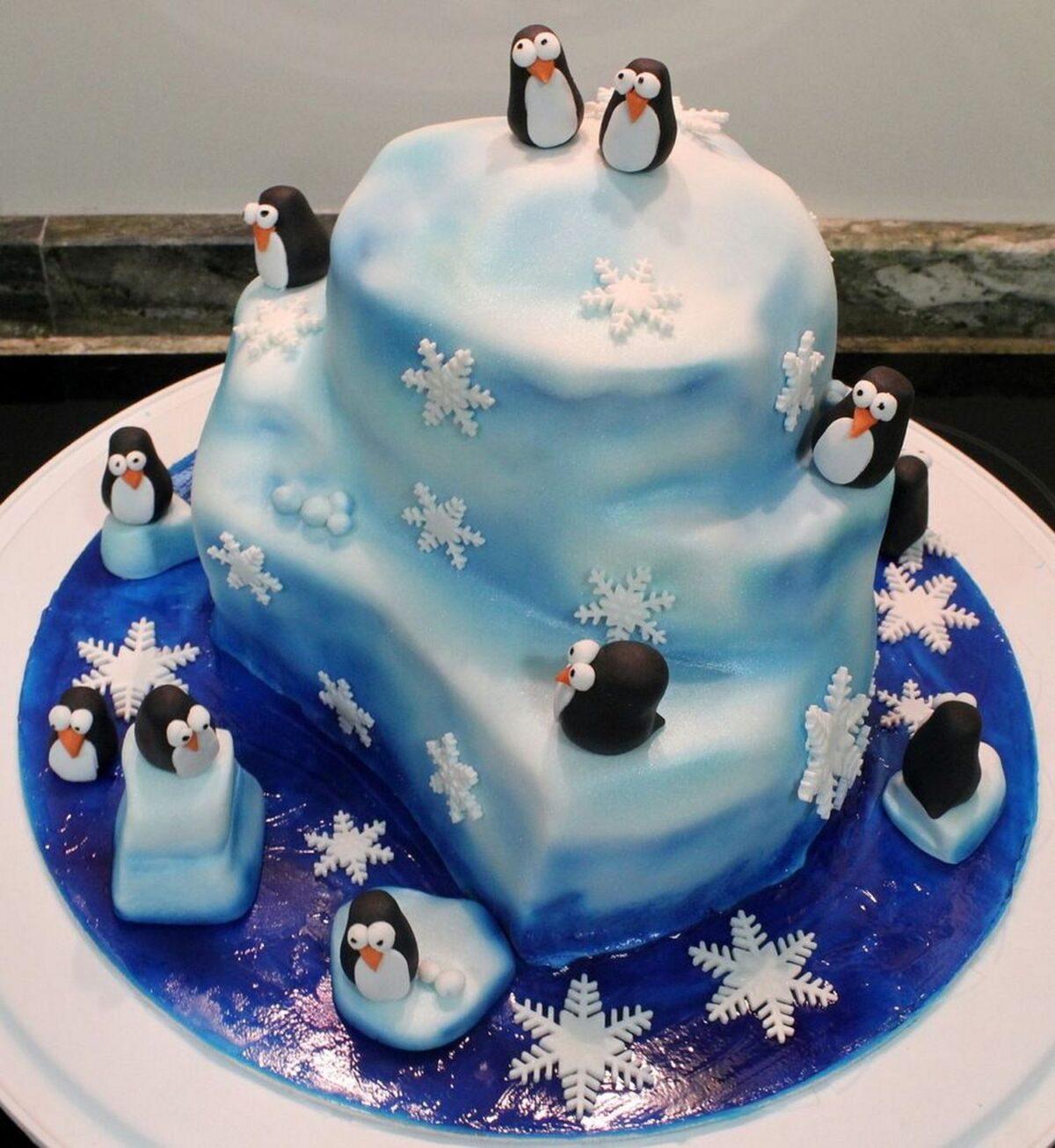 Iceberg Themed Birthday Cakes With Edible Snowflakes And Penguins