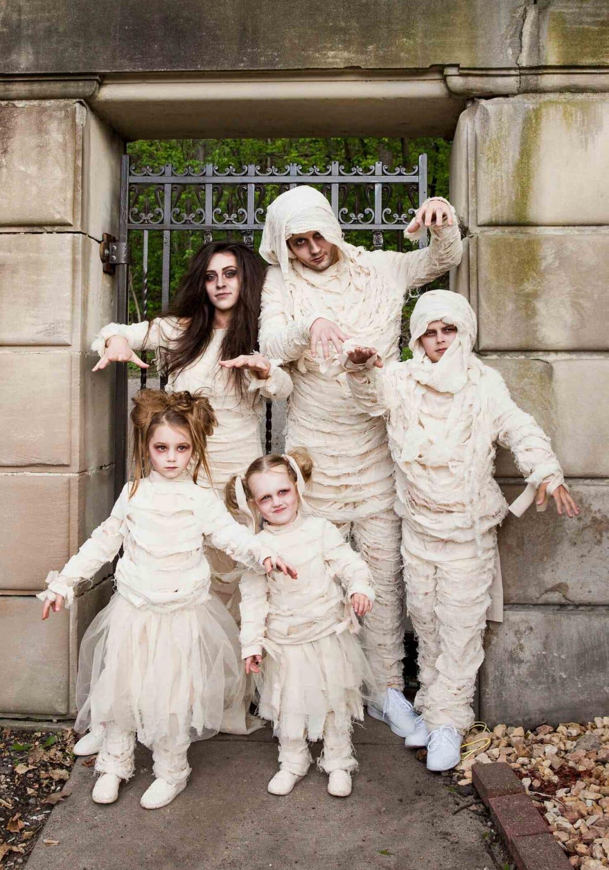 Family Wearing Mismatching Mummy Costume