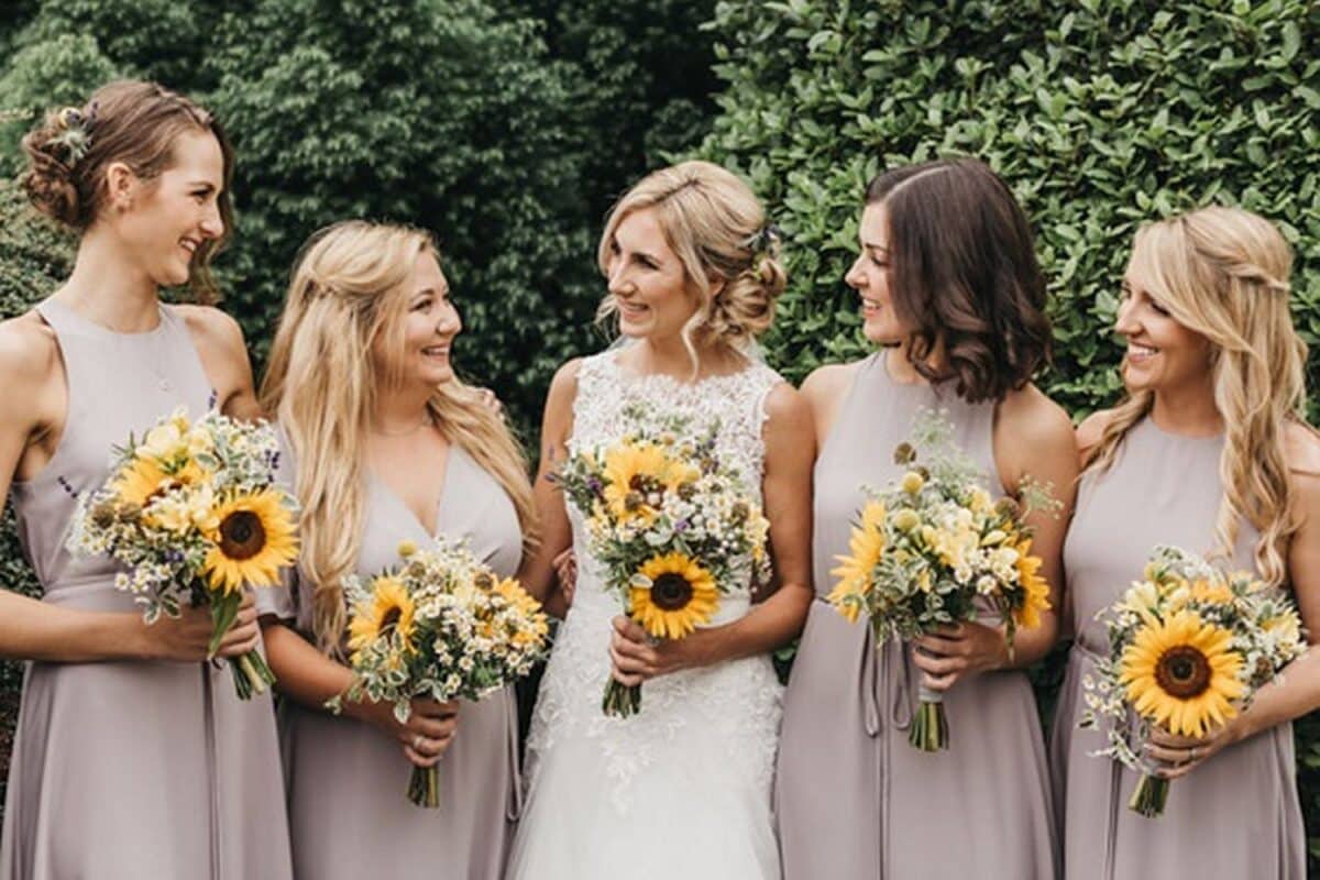 Bride and Bridesmaids holding Sunflower bouquets