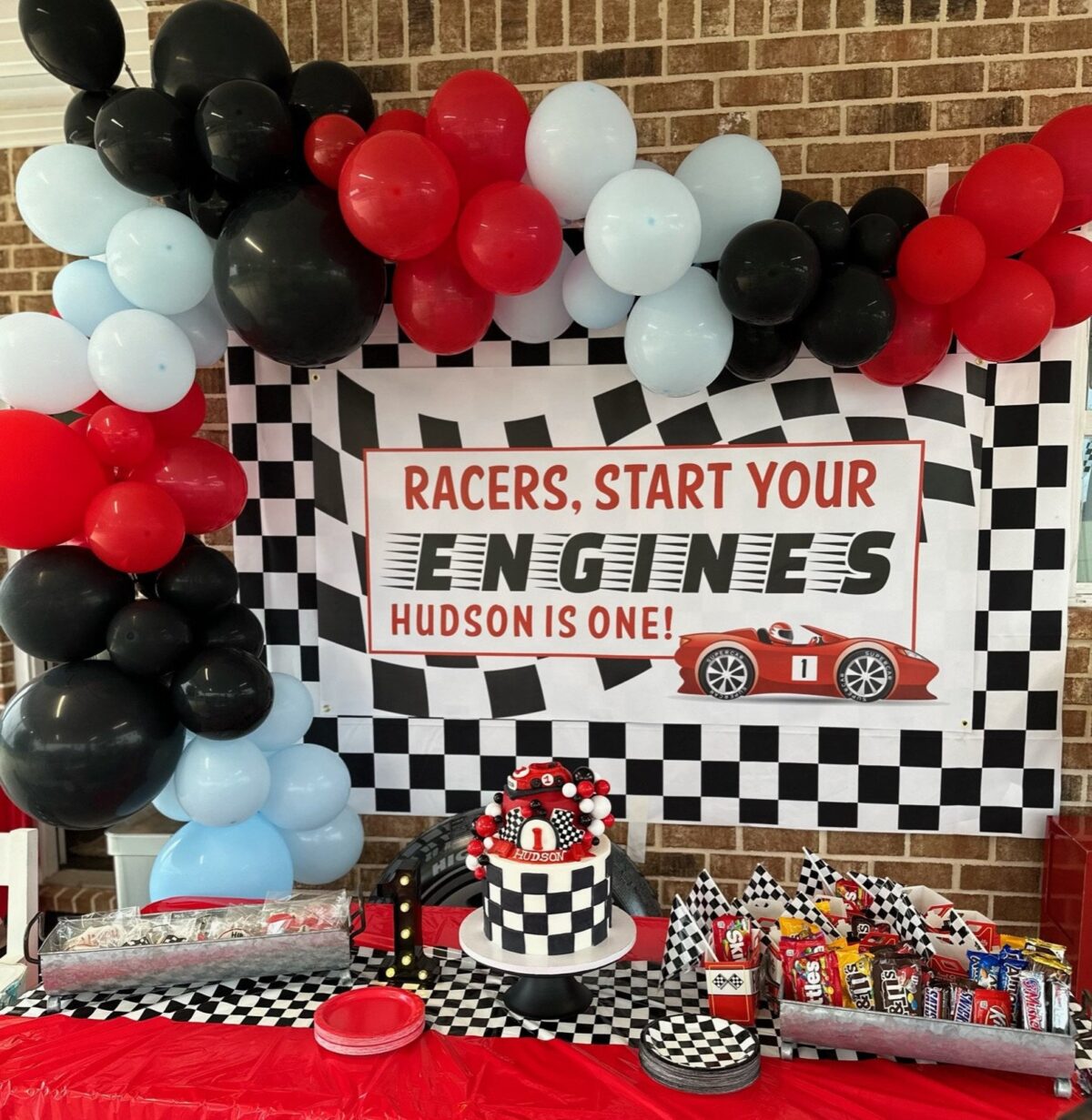 Race Car Checkered Flag Banner with White, Black and Red Balloon Garland