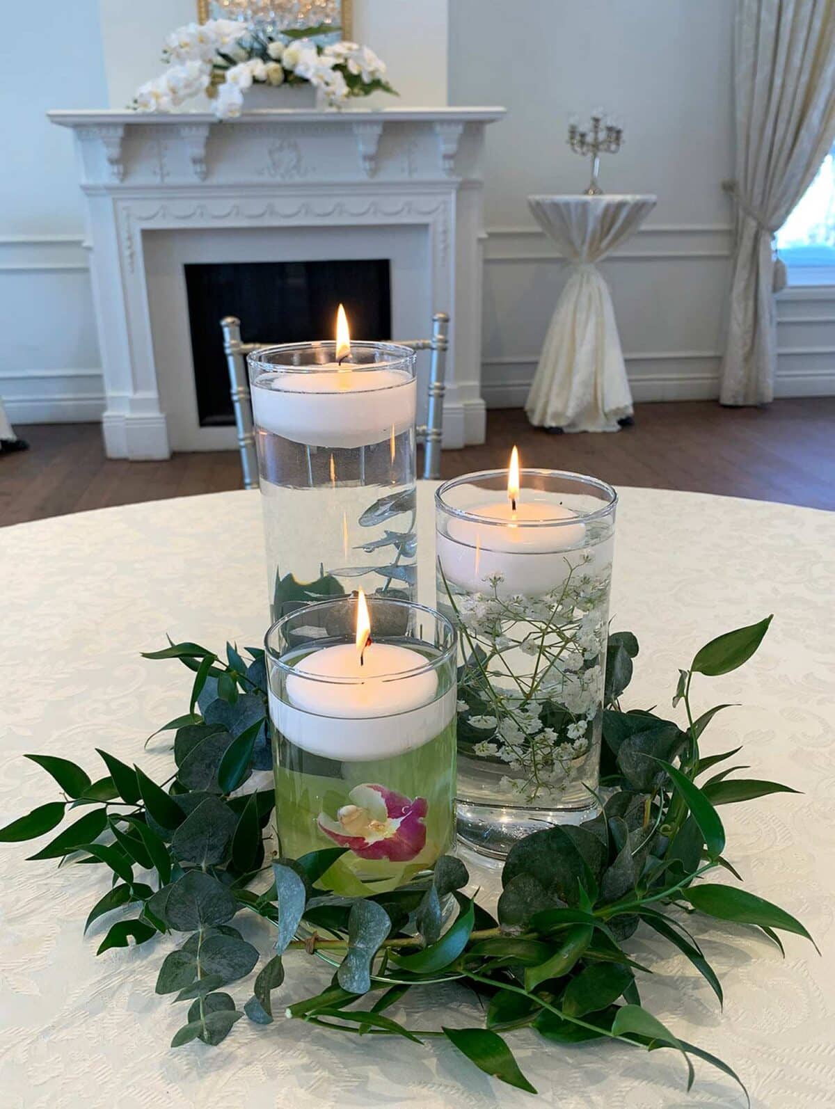 Gorgeous greenery and Floating Candle centerpiece