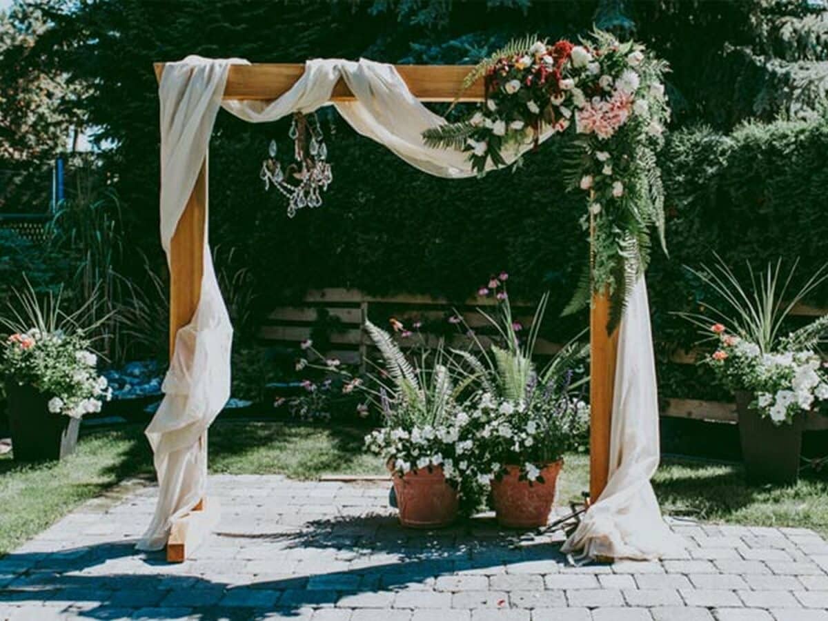 Greenery And Floral Wooden Arch Wedding