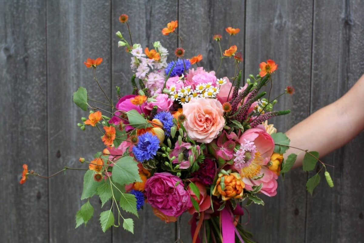 Summer Wedding Bouquet consists of Rose, baby's breath flower and more