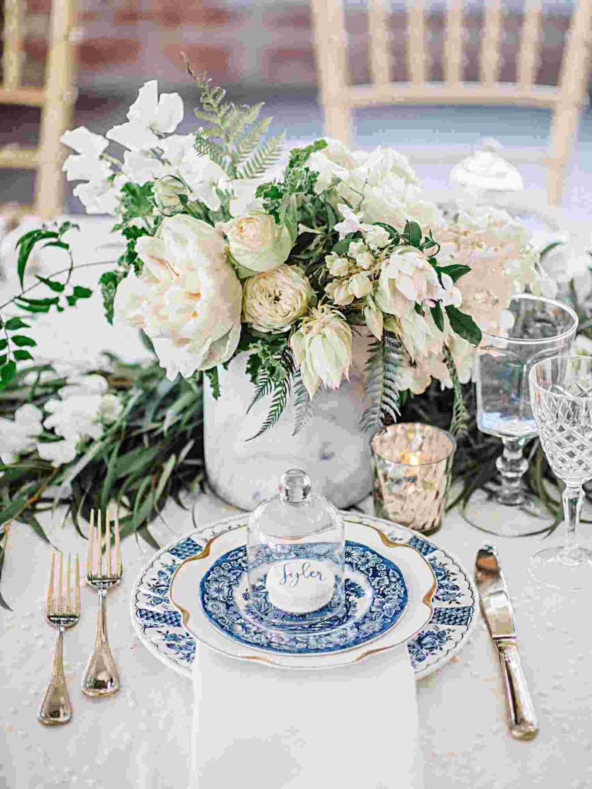 white rose and baby's breath flower centerpiece