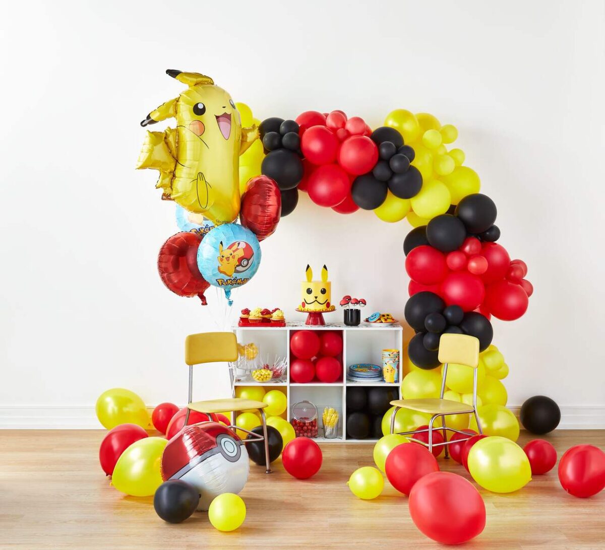 DIY Red black and yellow balloon arch of Pokemon Pikachu birthday party