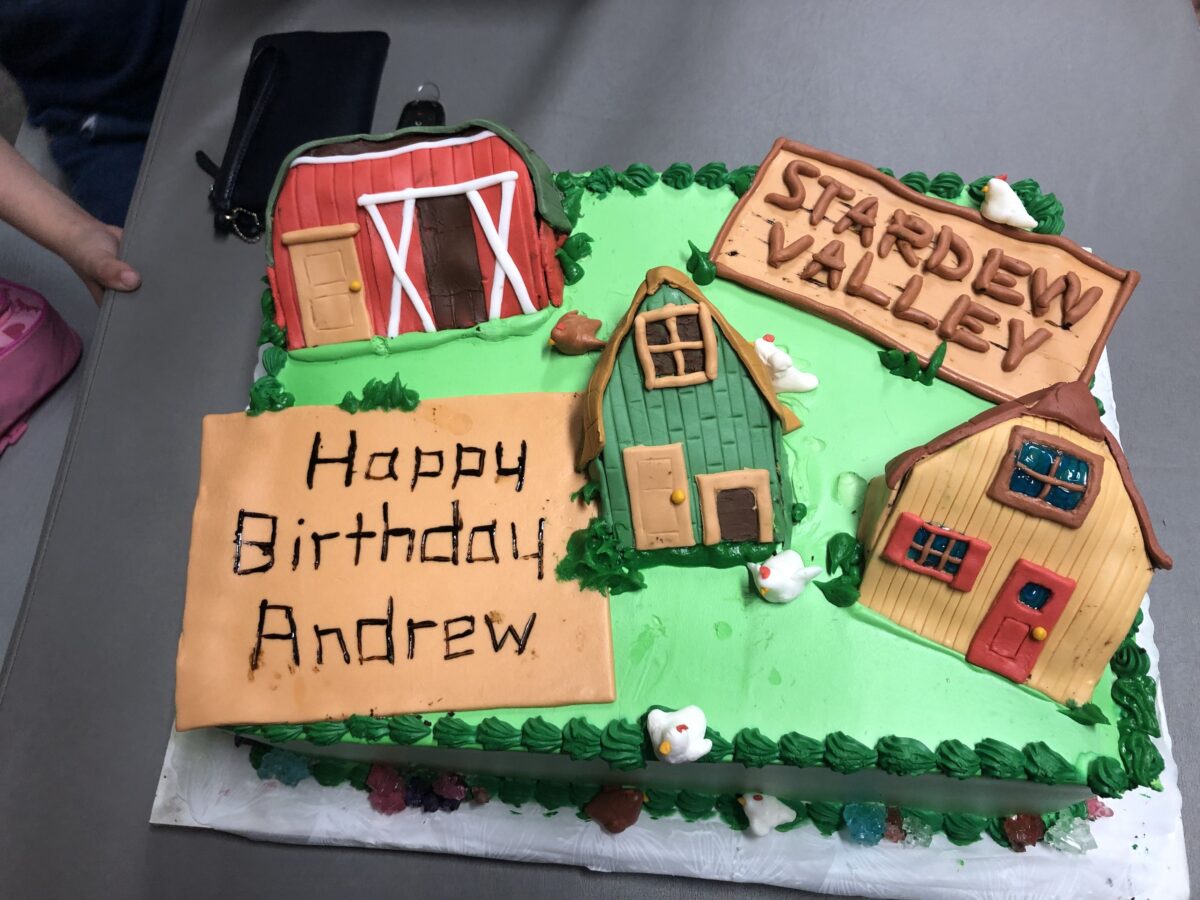 Stardew Valley Birthday sheet cake with edible fondant farmhouse barn and grass