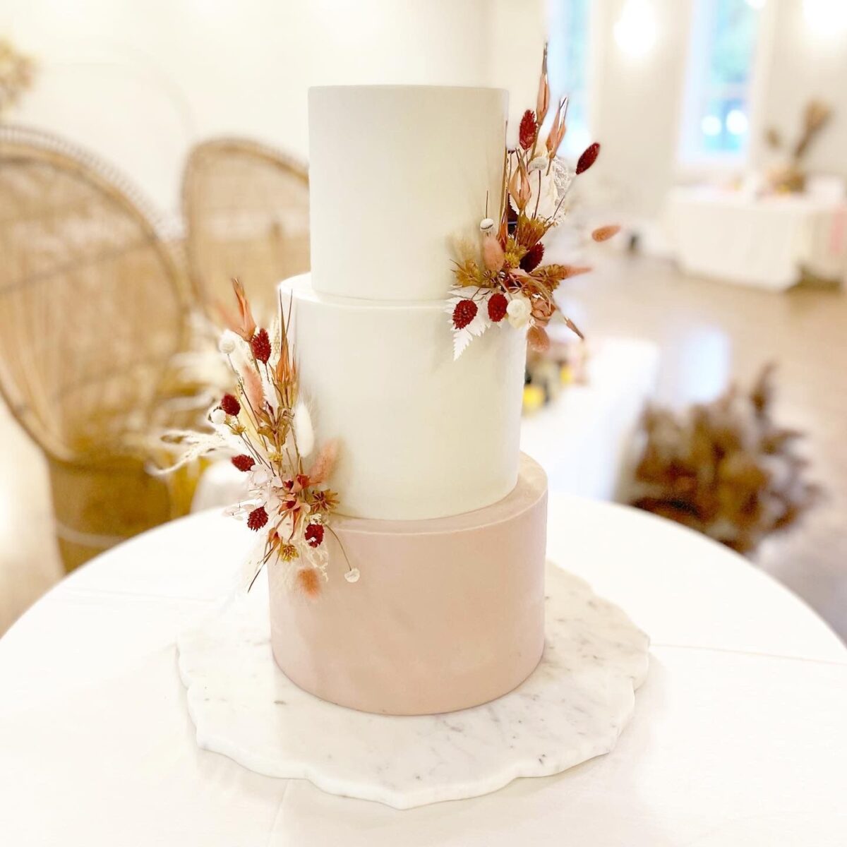 enchanting 3-tiered boho inspired cake with boho pampas and baby's breath flower